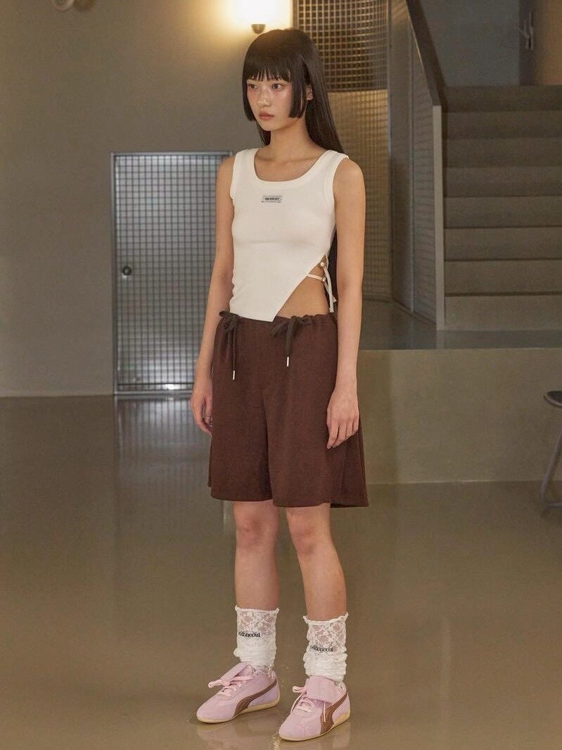 【ODDONEOUT】SIDE BUCKLE SLIT TOP