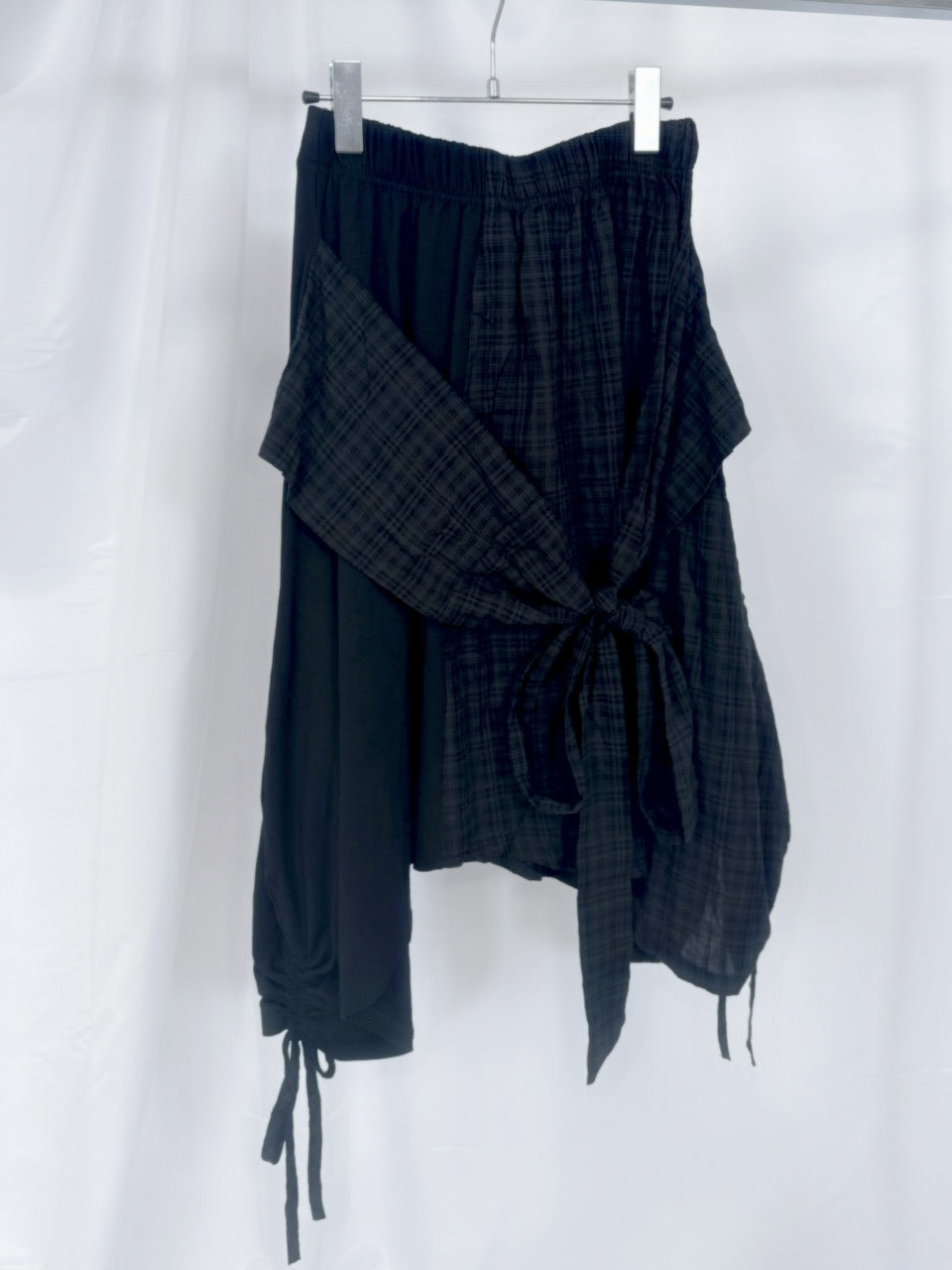 国際配送【Nerd out XU】docking ribbon check asymmetry skirt