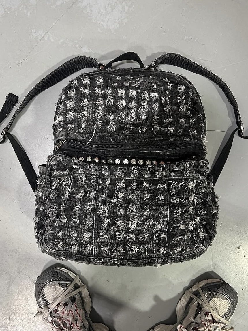 【Reckless Scholars】CAMMO TRASHED STUDDED BACKPACK / 【レックレス スカラーズ】トラッシュスタッズバックパック