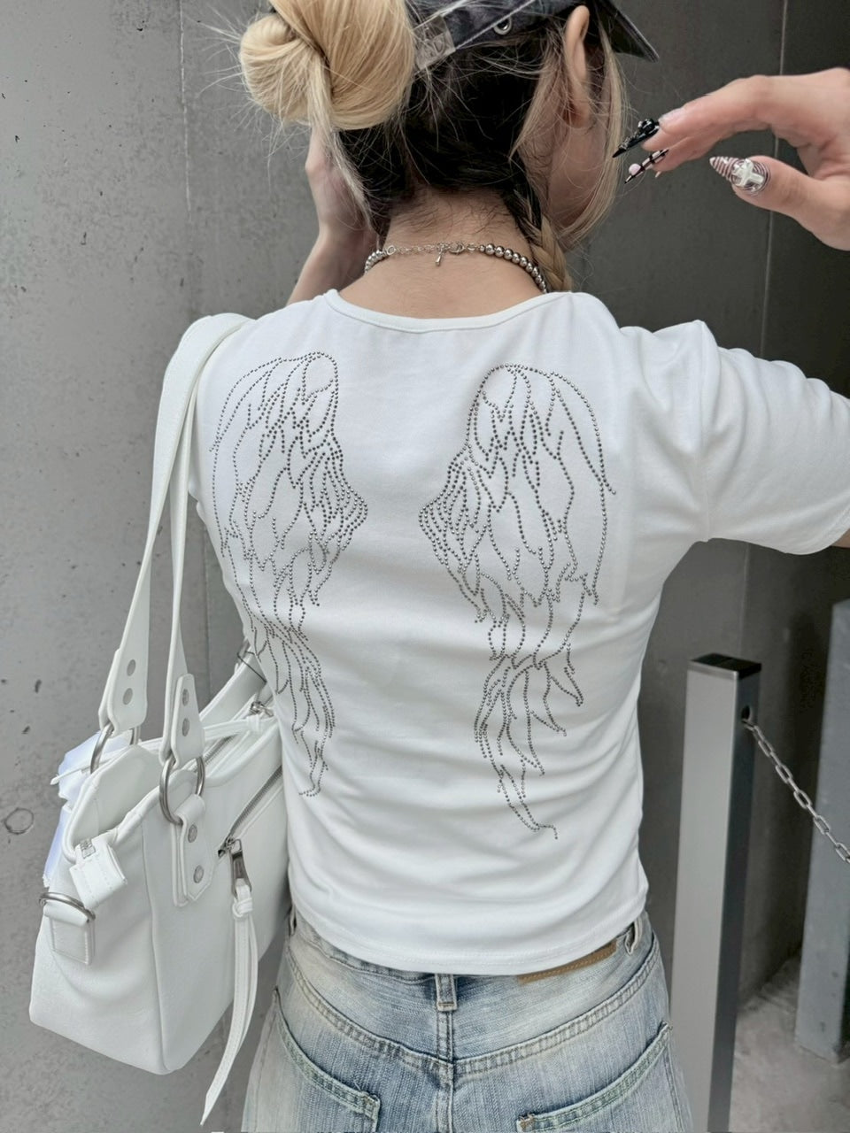 【nmtc +】feather design tee (2color) / 【エヌエムティーシープラス】フェザーデザインプリント半袖Tシャツ