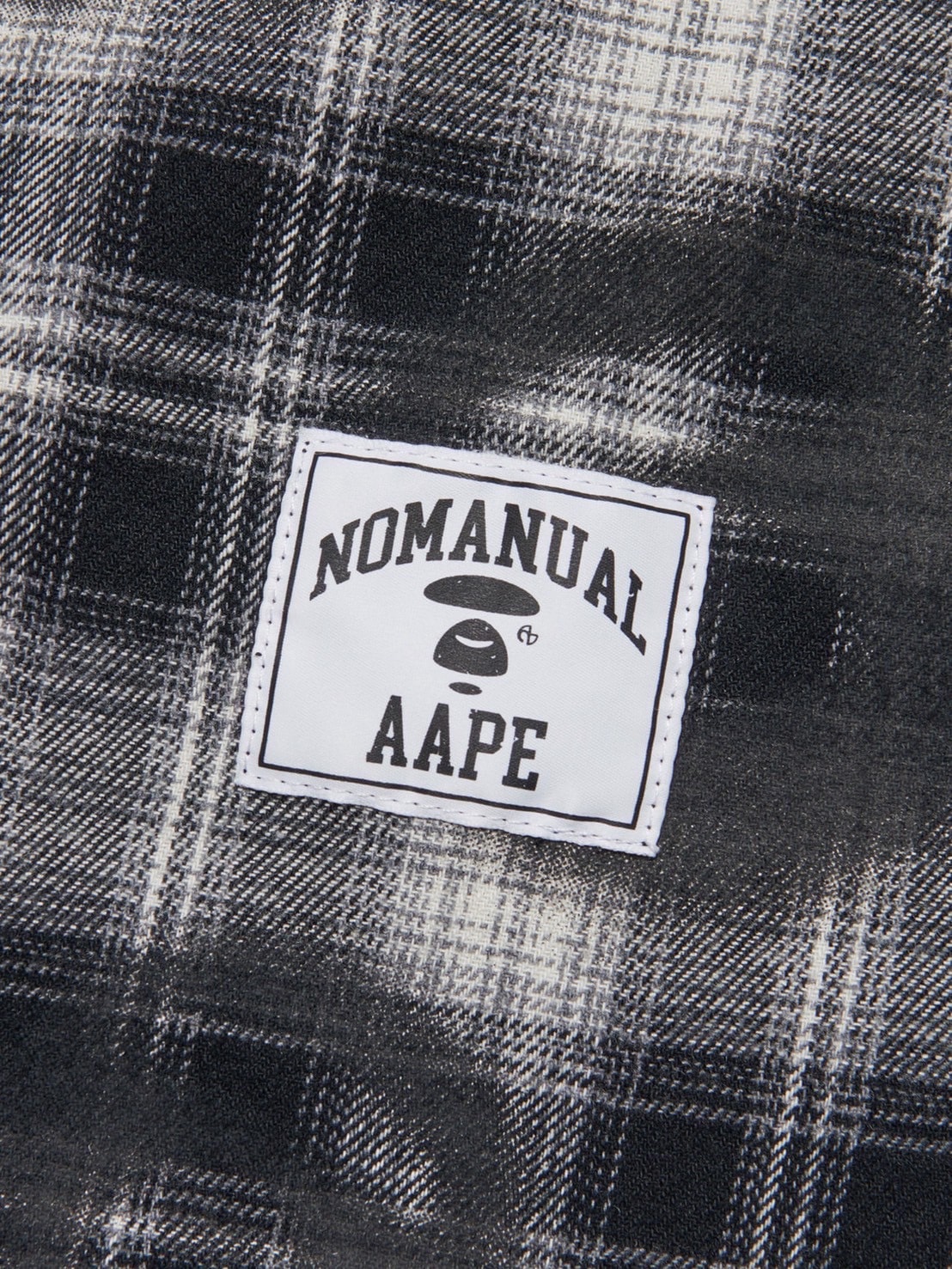 【AAPE X NOMANUAL】AAPE X NOMANUAL SPRAYED SYMBOL CHECK SHIRT