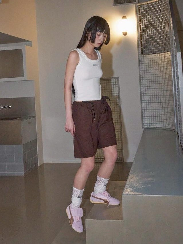 【ODDONEOUT】SIDE BUCKLE SLIT TOP