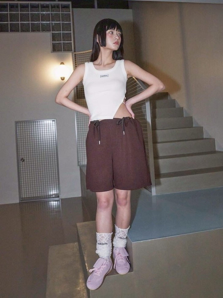 【ODDONEOUT】SIDE BUCKLE SLIT TOP
