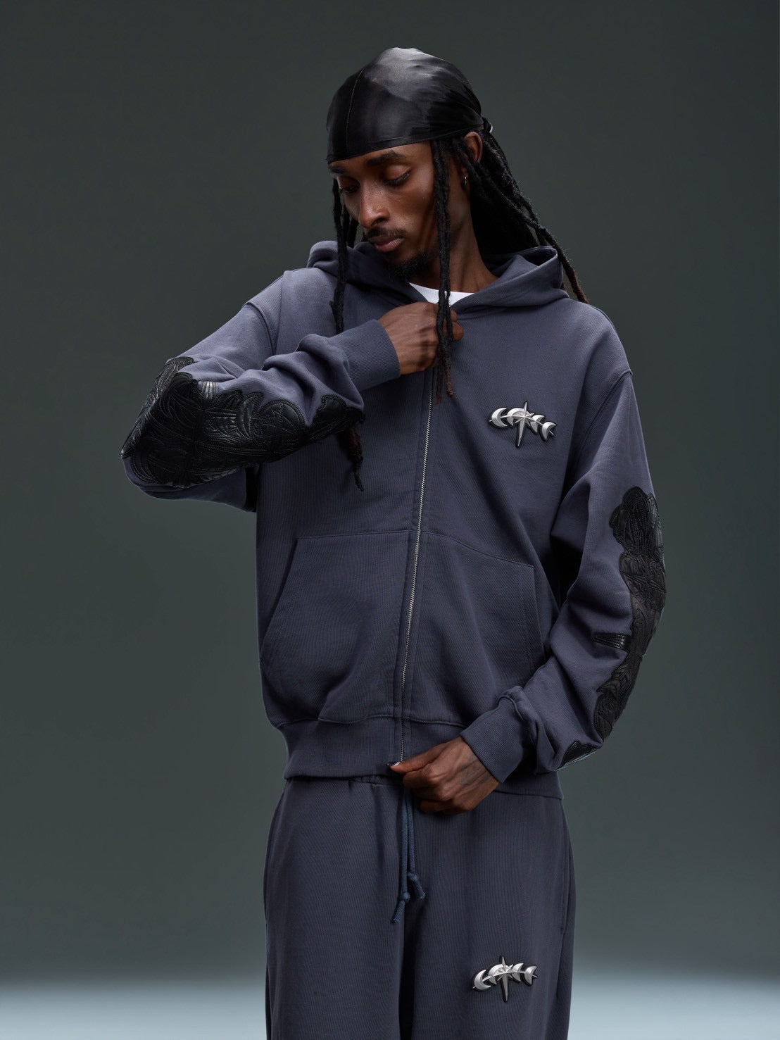 【The Boy Has No Patience】LEATHER PATCH ZIP HOODIE
