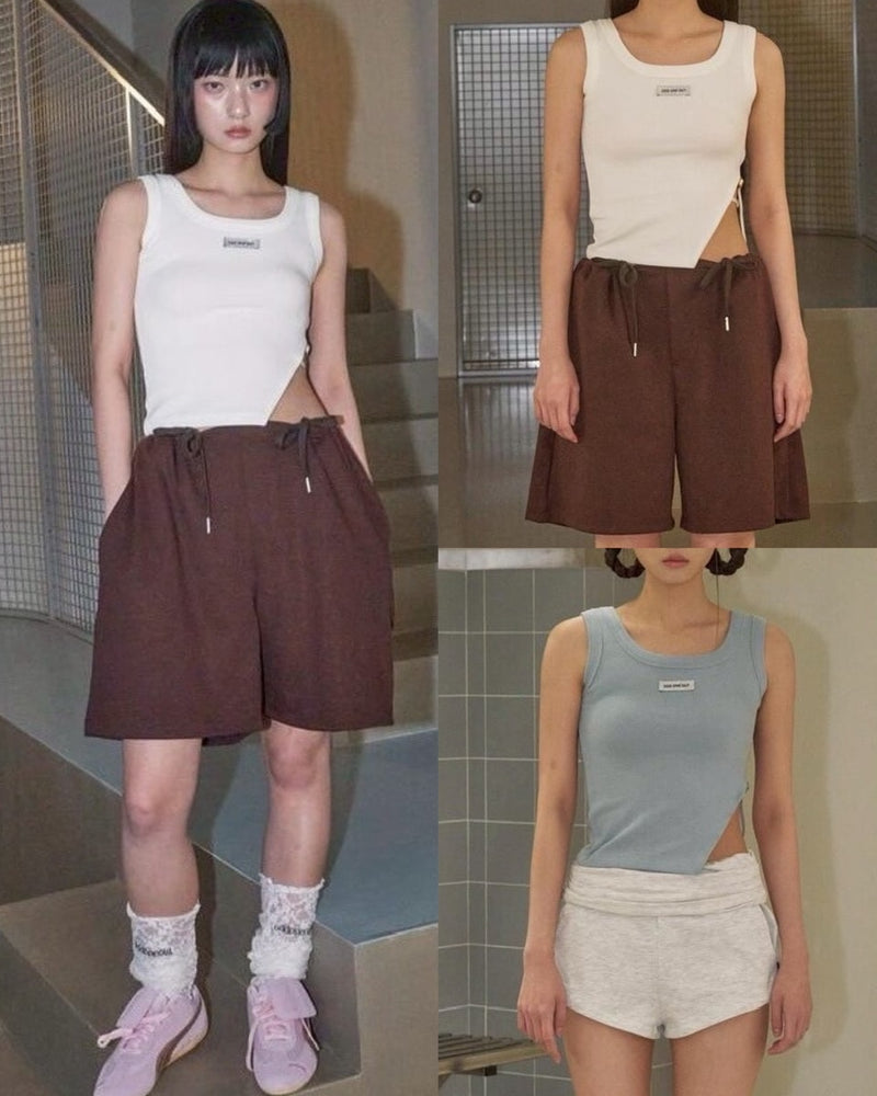 【ODDONEOUT】SIDE BUCKLE SLIT TOP