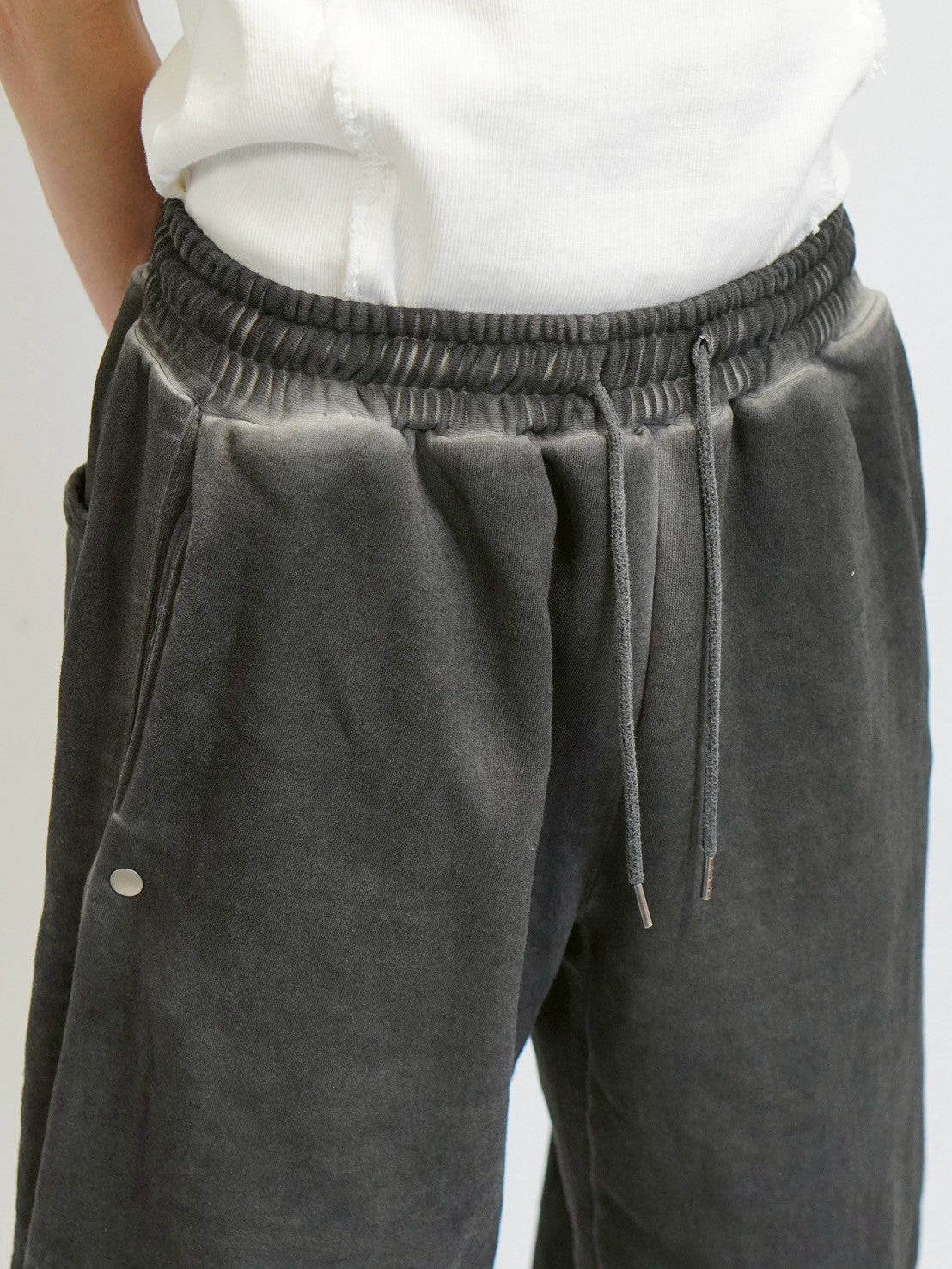 【DIG YOUR OWN GRAVE】Spray coating sweat pants