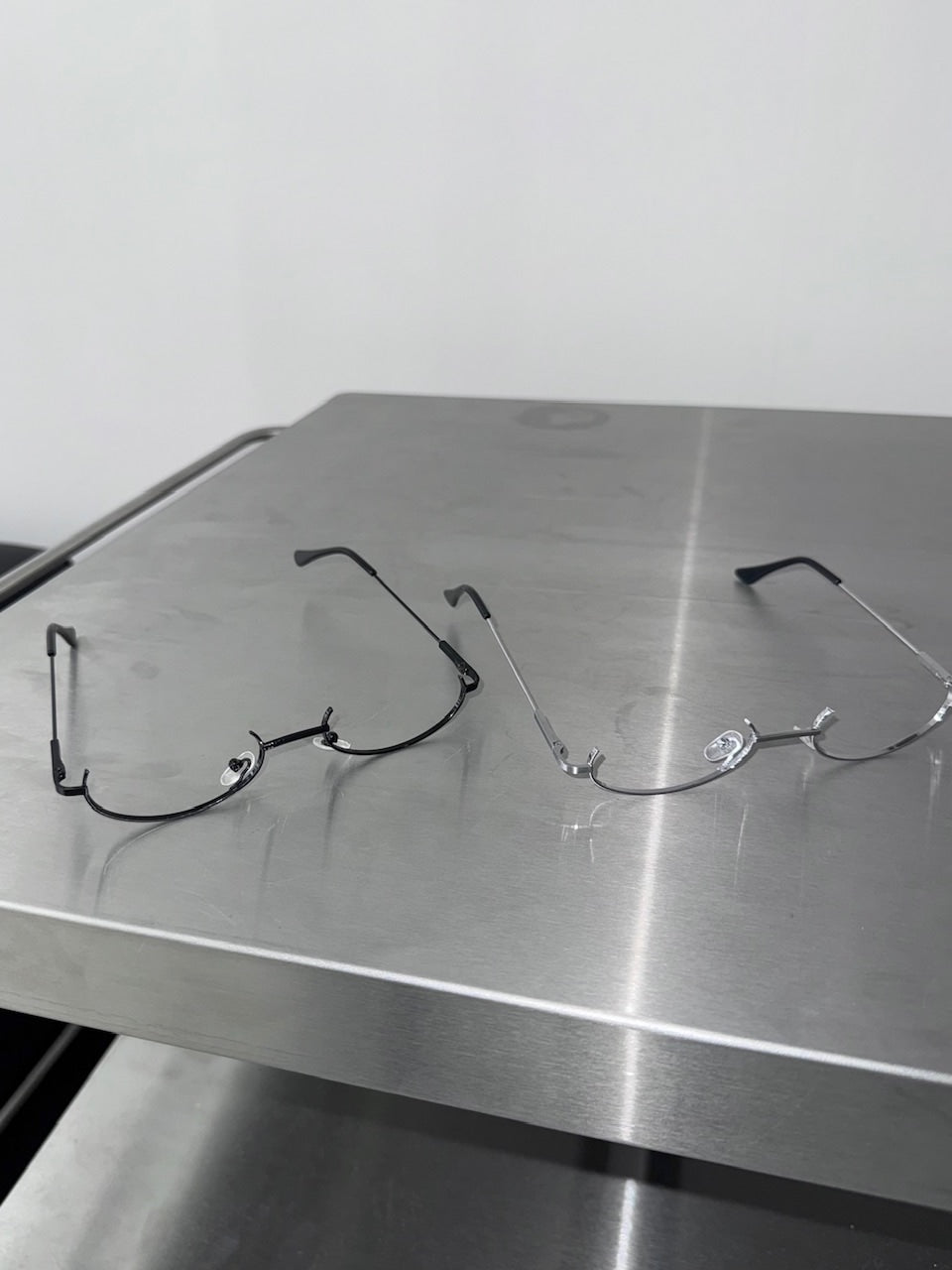 国際配送【Nerd out XU】under rim eye wear (2color) / 【ナードアウトエックスユー】アンダーフレームリムレスメガネ