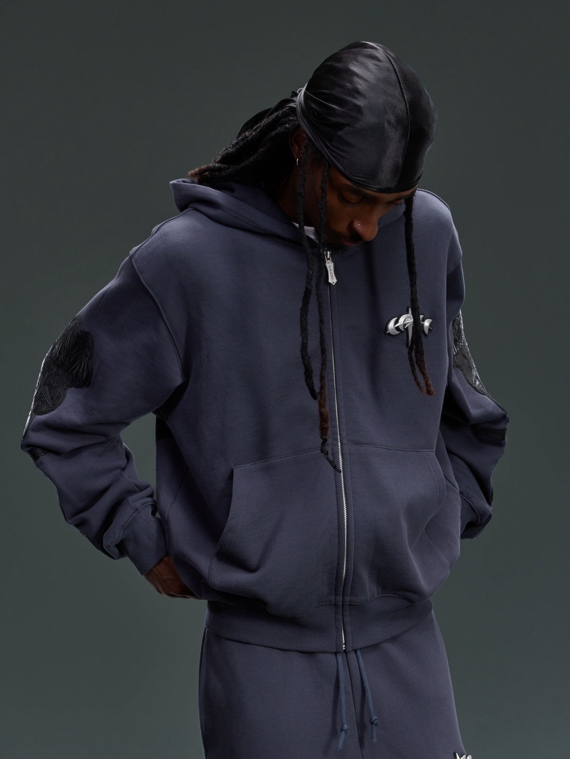 【The Boy Has No Patience】LEATHER PATCH ZIP HOODIE