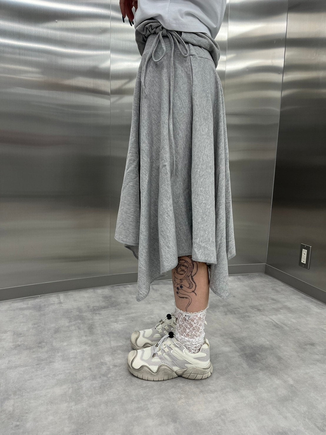 受注制【nmtc +】asymmetry midi skirt (2color)