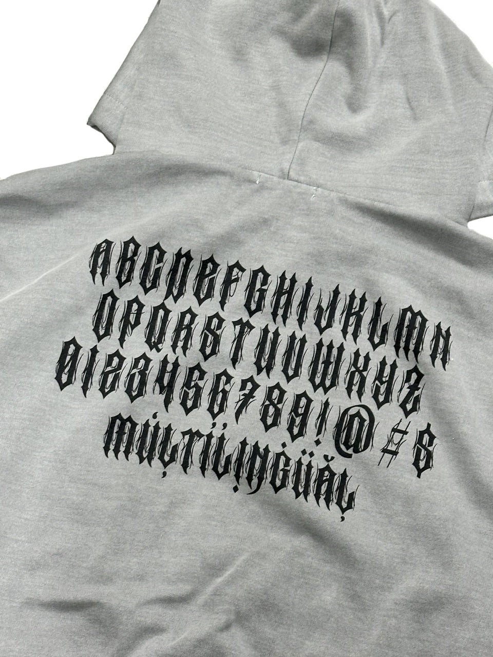 受注制【Never mind the XU】pigment lettering zip up hoodie (2color)