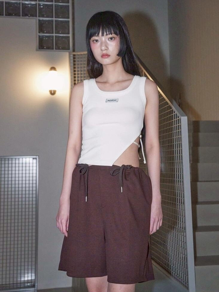 【ODDONEOUT】SIDE BUCKLE SLIT TOP