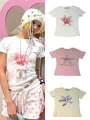 国際配送【Never mind the XU】flower rhinestone tee (3color)