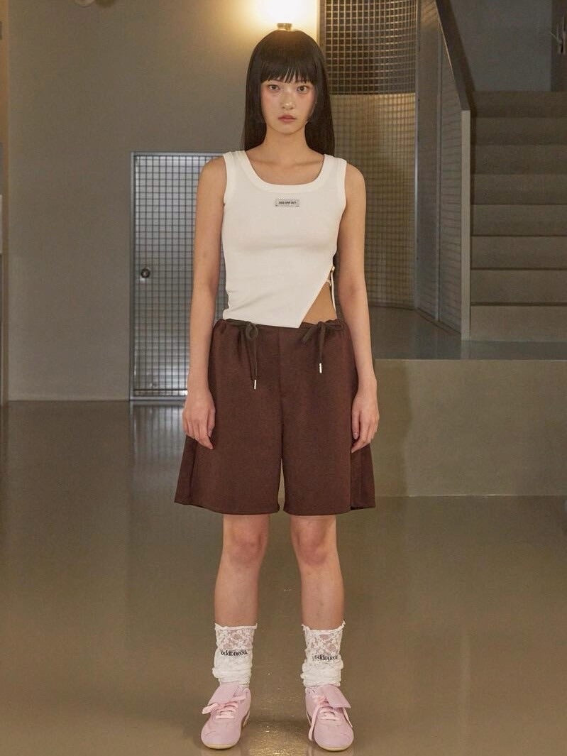 【ODDONEOUT】SIDE BUCKLE SLIT TOP