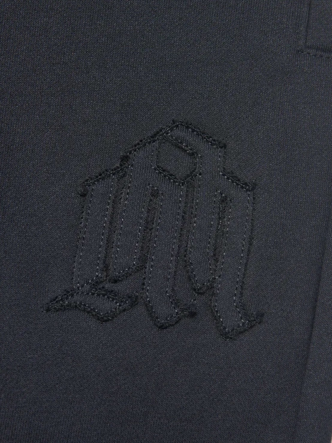 【NOMANUAL】OVERLAY LOGO SWEATPANTS