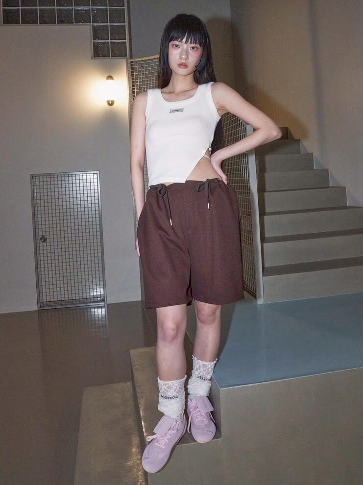 【ODDONEOUT】SIDE BUCKLE SLIT TOP