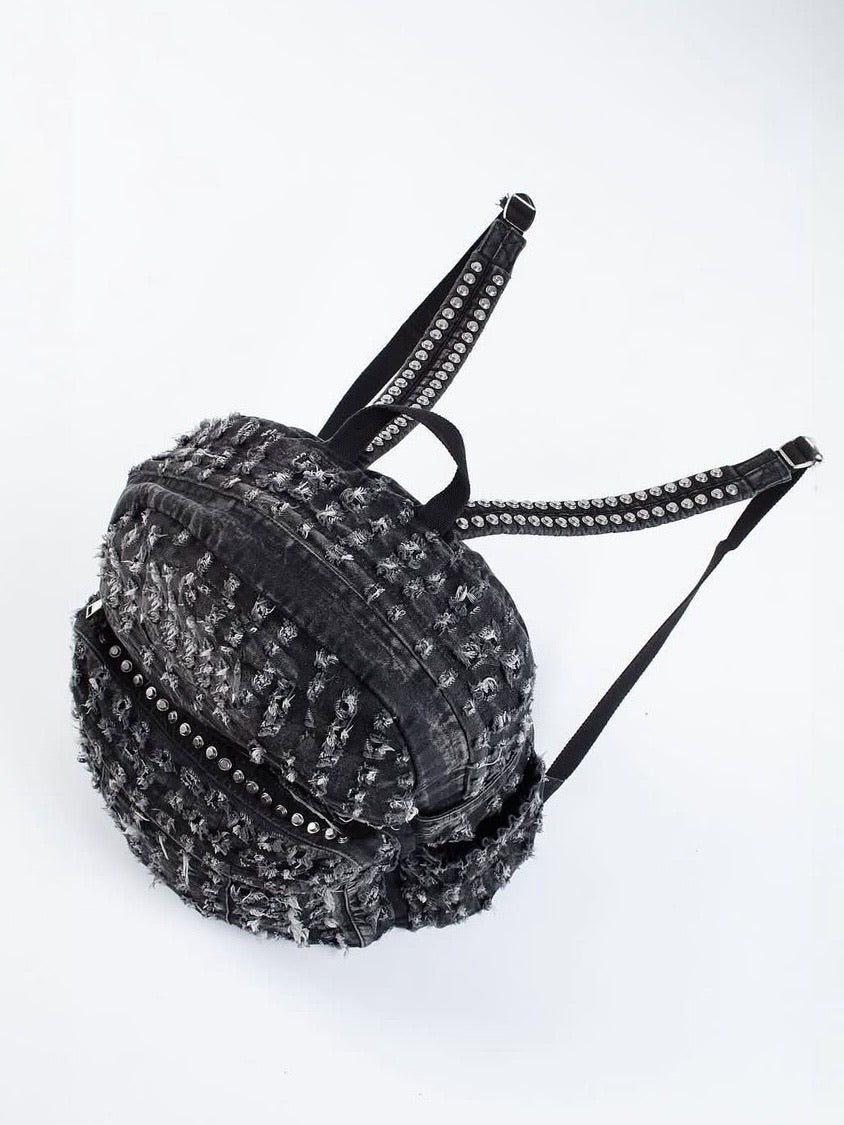 【Reckless Scholars】CAMMO TRASHED STUDDED BACKPACK / 【レックレス スカラーズ】トラッシュスタッズバックパック