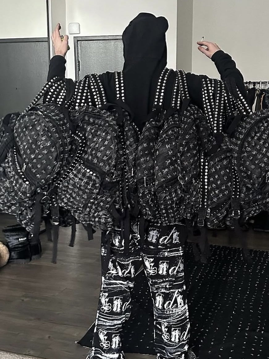 【Reckless Scholars】CAMMO TRASHED STUDDED BACKPACK / 【レックレス スカラーズ】トラッシュスタッズバックパック