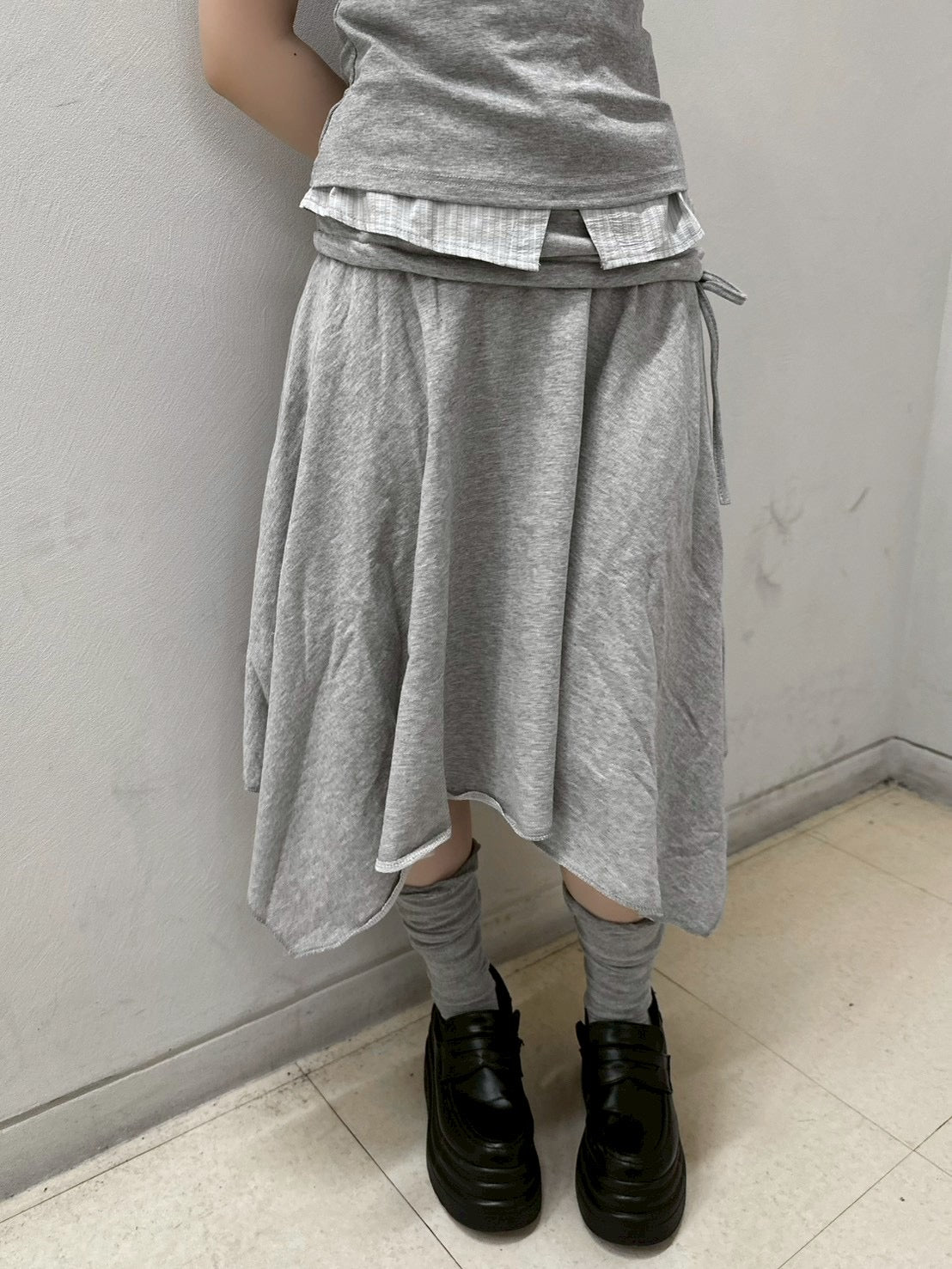 受注制【nmtc+】asymmetry midi skirt (2color)