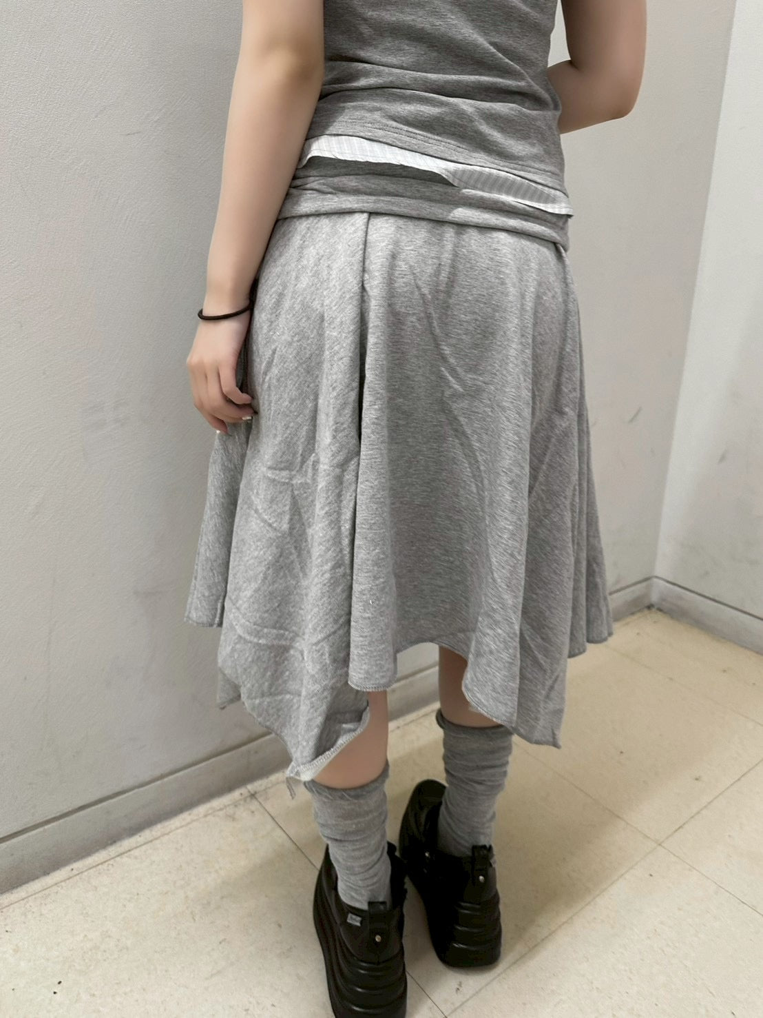 受注制【nmtc+】asymmetry midi skirt (2color)