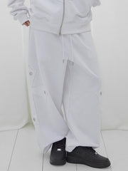【FANCY CLUB】BIG CROSS EYELET SWEATPANTS