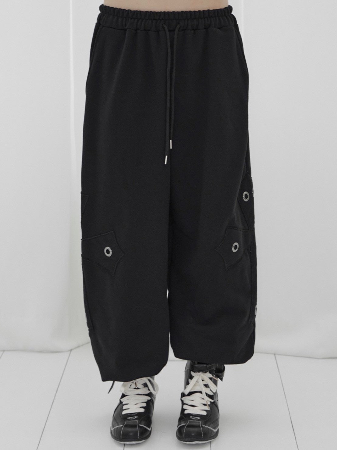 【FANCY CLUB】BIG CROSS EYELET SWEATPANTS