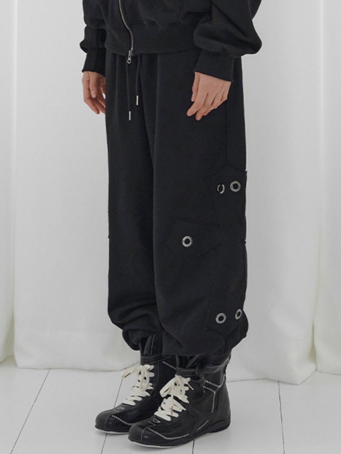 【FANCY CLUB】BIG CROSS EYELET SWEATPANTS