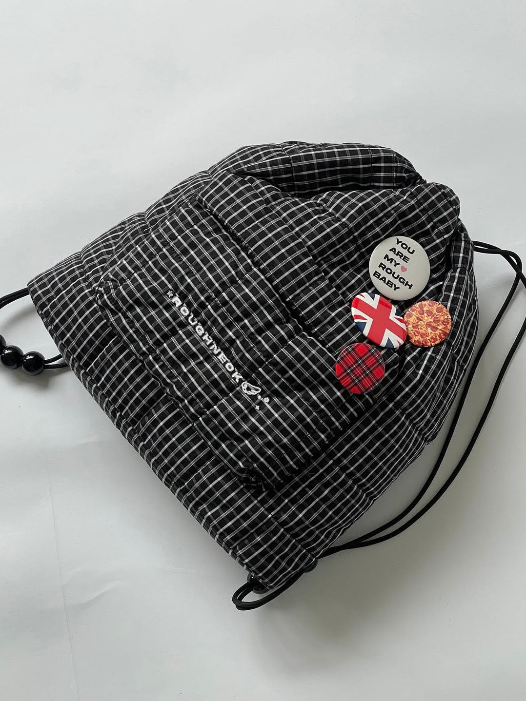 【ROUGH NECK】
Check String Backpack