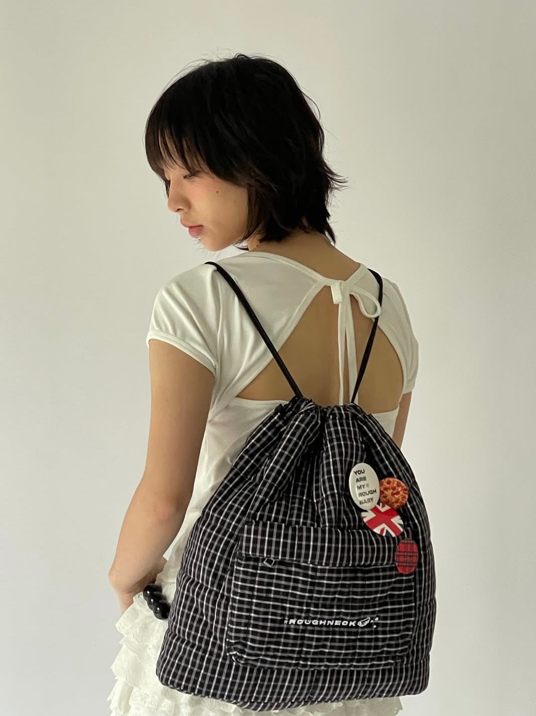 【ROUGH NECK】
Check String Backpack